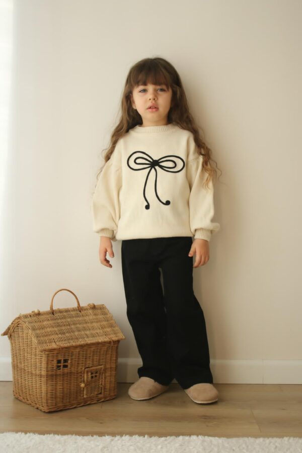 Girls' Bow Knit Sweater and Black Pants Outfit